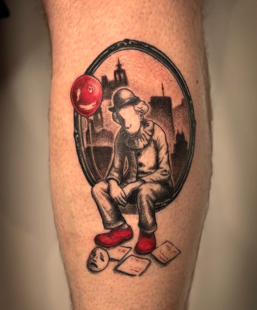 Sad clown tattoo in surreal style for men Sad clown tattoo in a surreal style leg man